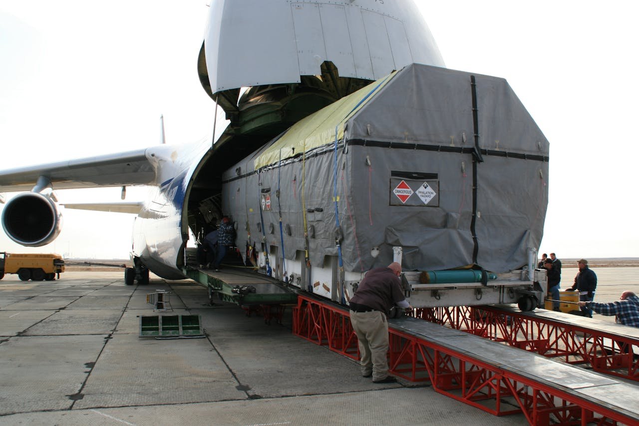 services-01 A massive cargo is loaded onto an Antonov aircraft at Baikonur, Kazakhstan.